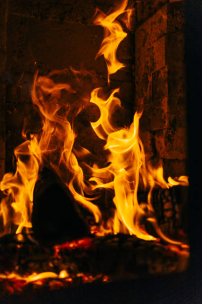 istock Close-up of fireplace with burning wood 1148093633