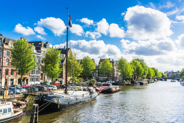 istock Amterdam canal, bridge and medieval houses 1148097222