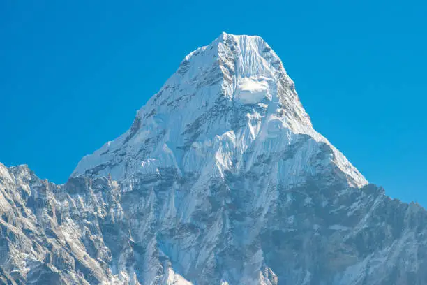 Photo of Scenery view of the main peak (6,812 m) of Mt.Ama Dablam in Himalaya range of eastern Nepal.