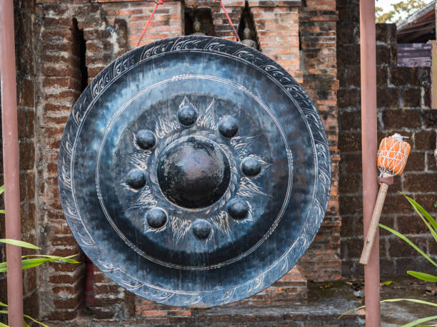 Ancient gong in Thai temple stock photo