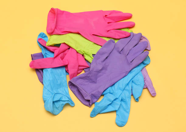 Colorful rubber medical gloves stock photo