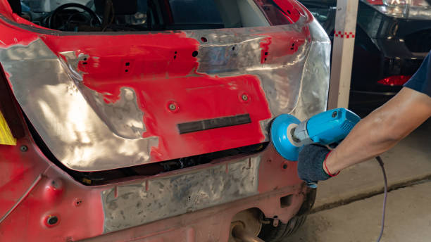 istock Worker repairing car body. 1148119190