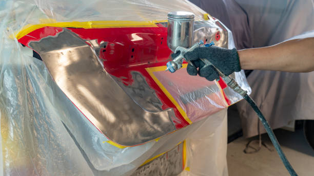 istock Worker repairing car body. 1148119199