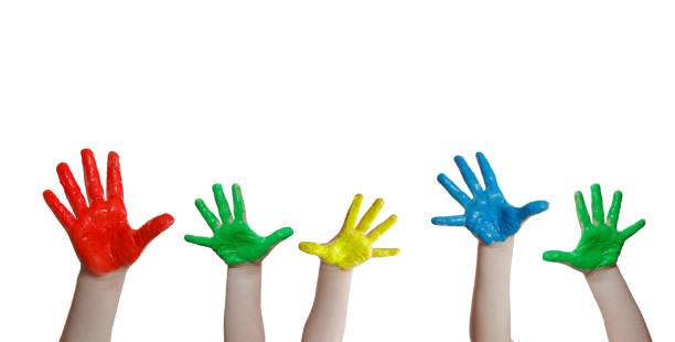 istock Child hands of different colors 1148119275