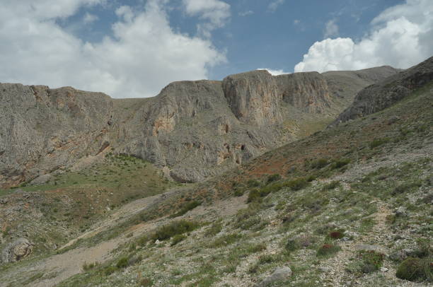 istock Taurus Mountains. Turkey. Steep cliffs and gorge. Snow-capped peaks. 1148121562
