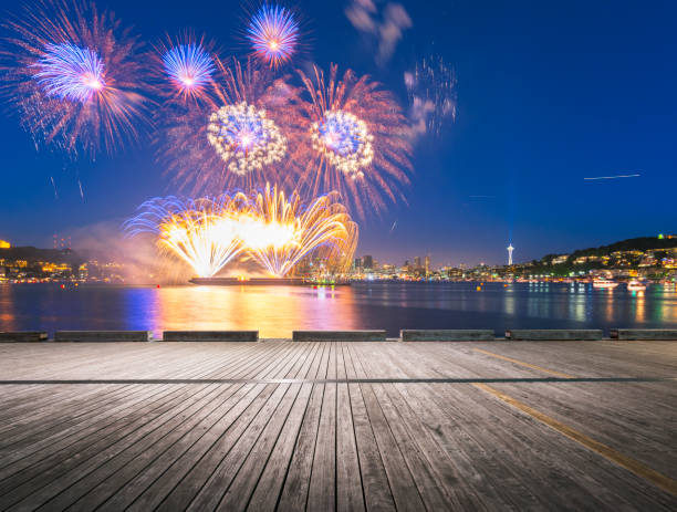 istock Fireworks exploding over Puget Sound, Seattle, Washington, United States 1148129229