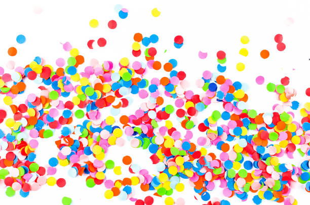istock Colorful assorted confetti with serpentine on white 1148130033