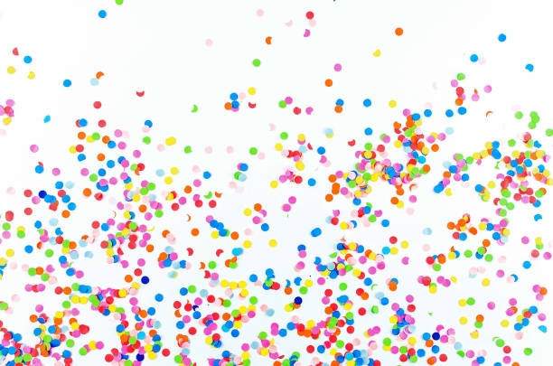 istock Colorful assorted confetti with serpentine on white 1148130060