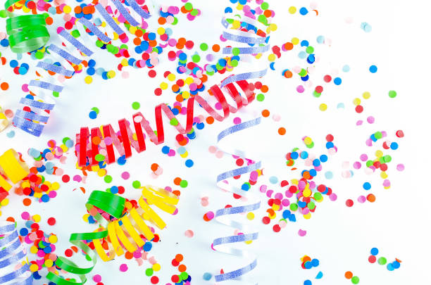 istock Colorful assorted confetti with serpentine on white 1148130111