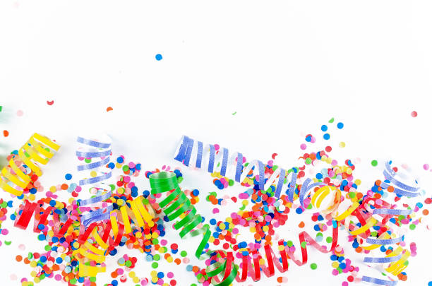 istock Colorful assorted confetti with serpentine on white 1148130139
