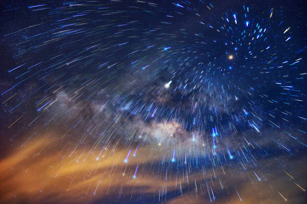Milky way and Meteor shower Detail from the milky way and Meteor shower at night, long speed exposure. meteor shower stock pictures, royalty-free photos & images