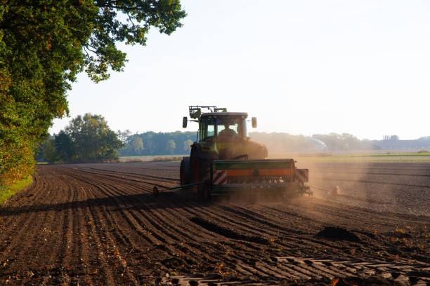 istock Field work with the tractor on the field 1148136778