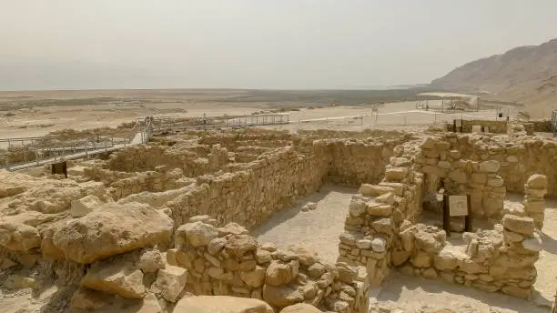 wide view of the excavated building ruins of the community at qumran near the dead sea in israel