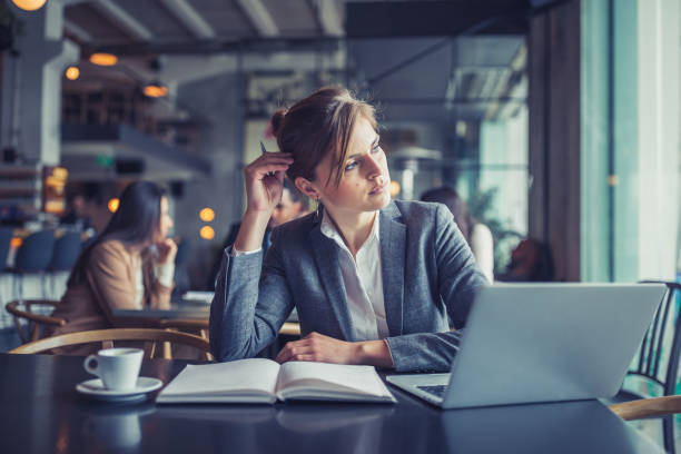 istock Businesswoman working on a coffee break 1148139693