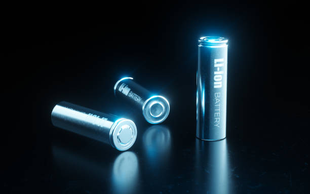 Close up concept of modern metal lithium ion battery cell used in electrical vehicle battery pack in blue light on black metal background. 3d rendering. Close up concept of modern metal lithium ion battery cell used in electrical vehicle battery pack in blue light on black metal background. 3d rendering. lithium ion battery stock pictures, royalty-free photos & images