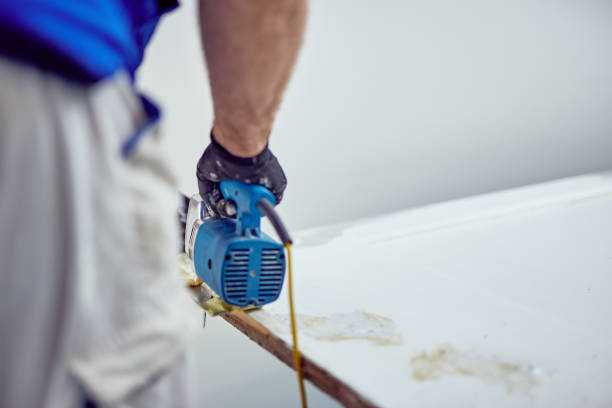 istock Handyman fixing / working on a house renovation. 1148143449
