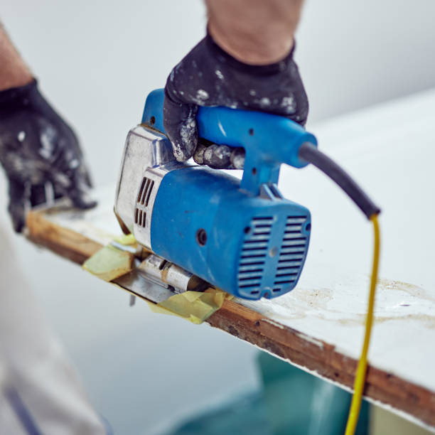 istock Handyman fixing / working on a house renovation. 1148143582