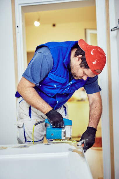 istock Handyman fixing / working on a house renovation. 1148143681
