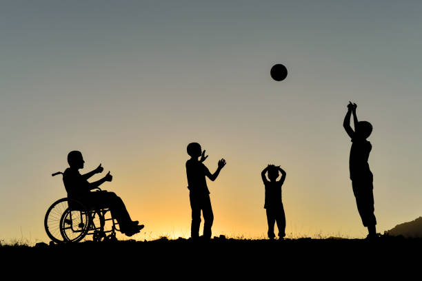 istock socialization of a disabled individual 1148144450