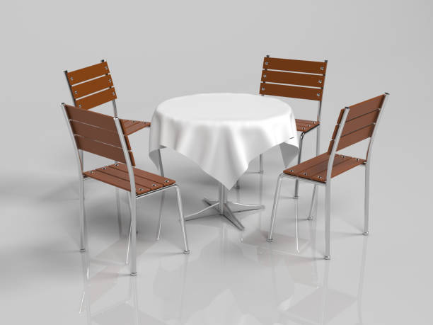 Round table with four wooden chairs. Cafe interior