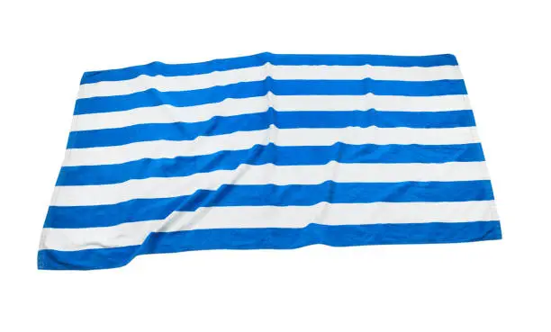 Beach stripped blue empty towel  isolated on white.
