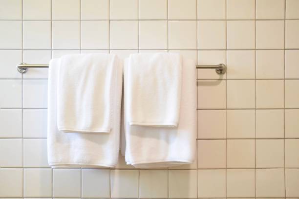 istock White towel on the hanger in bathroom 1148149201