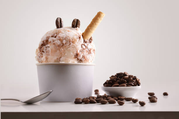 istock Composition of coffee ice cream ball in paper cup 1148149223