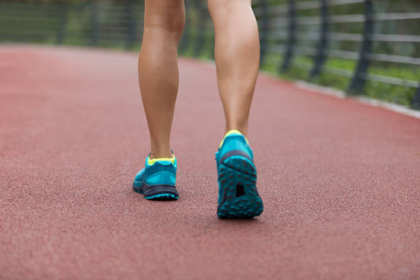 istock Young woman runner legs ready for running on trail 1148154044
