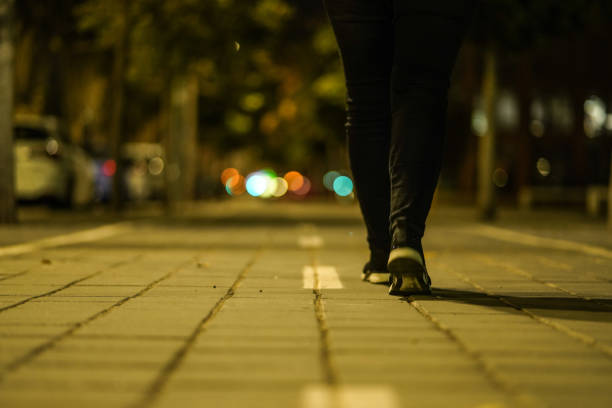 istock Woman's legs walking in the city 1148154581