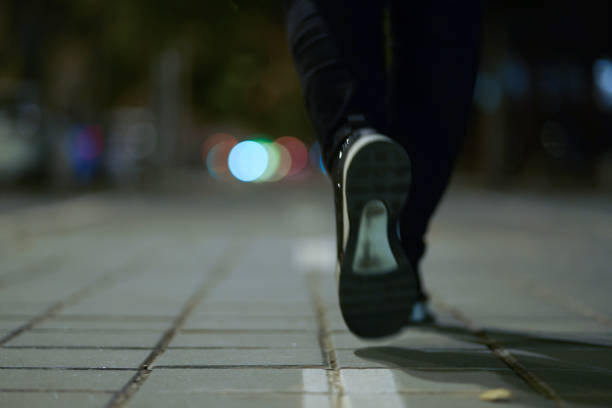 istock Woman's legs walking in the city 1148154586