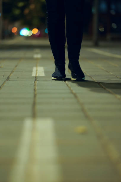 istock Woman's legs walking in the city 1148154596