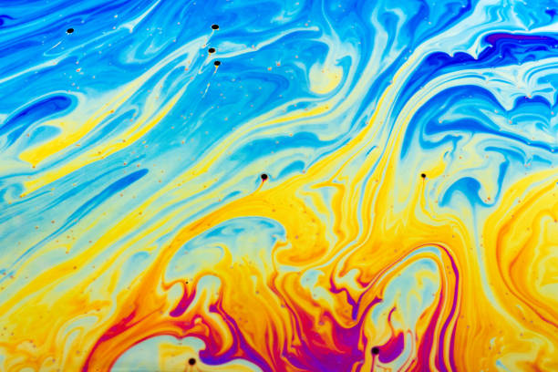 istock Abstract colorful liquid background. Macro shot of a soap bubble. 1148157461