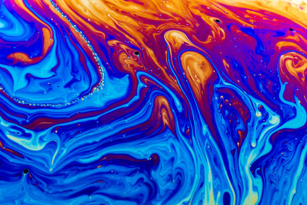istock Abstract colorful liquid background. Macro shot of a soap bubble. 1148157467