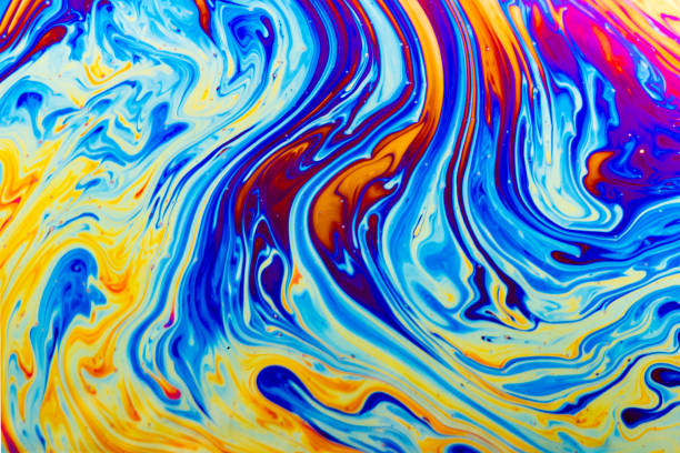 istock Abstract colorful liquid background. Macro shot of a soap bubble. 1148157486