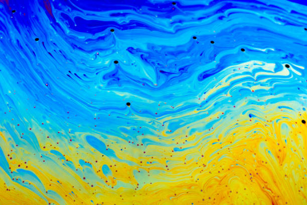 Soap bubble closeup. Abstraction background with bright acid colors.