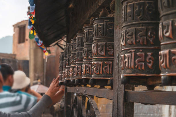 istock Tibetan prayer wheels at Swayambhunath, Nepal 1148158372