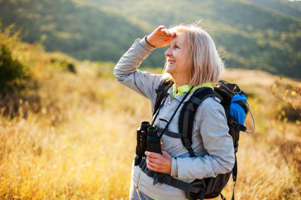 istock Senior woman hiking 1148164092