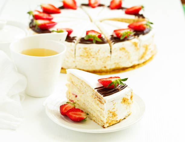 istock Sponge cake with strawberries and cream. Selective focus. 1148166810
