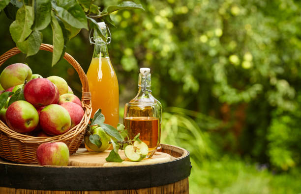 istock apples on background orchard standing on a barrel. Apple juice and apple preserves. 1148166853