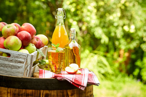 istock apples on background orchard standing on a barrel. Apple juice and apple preserves. 1148166864