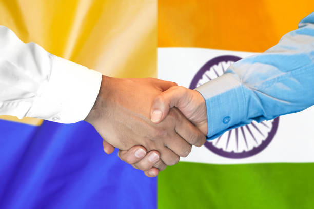 istock handshake on India and Ukraine flag background. 1148168428