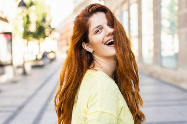 istock Beautiful woman looking back over her shoulder 1148168561