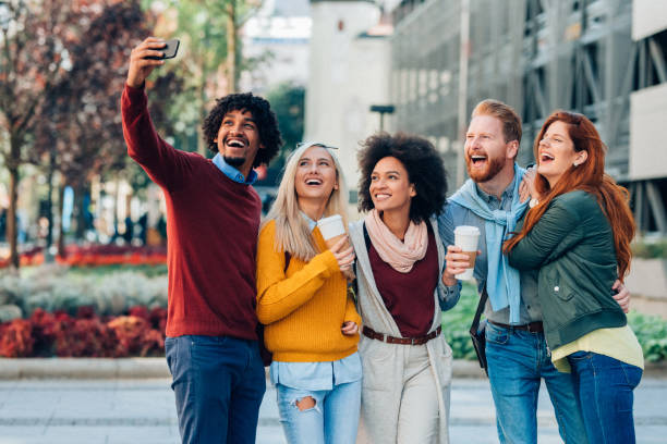 istock Multi-ethnic group of friends taking selfie 1148168576