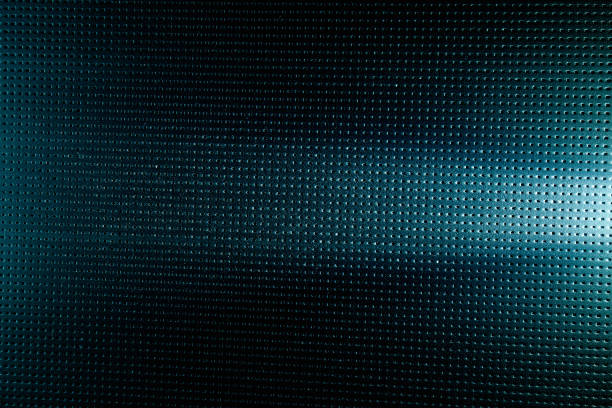 istock Horizontal beam of light on a dark blue background to a black dot 1148168827