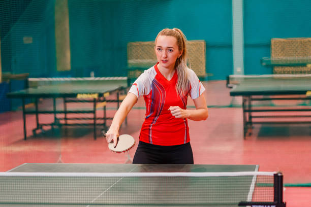 istock young woman athlete plays ping pong 1148171240