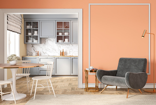 Modern classic peach beige interior with lounge chair, armchair, kitchen, dining table, carpet, floor lamp and mouldings. 3d render illustration mock up.