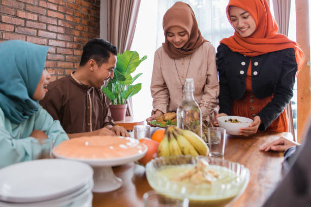 istock muslim people having some food together 1148174693