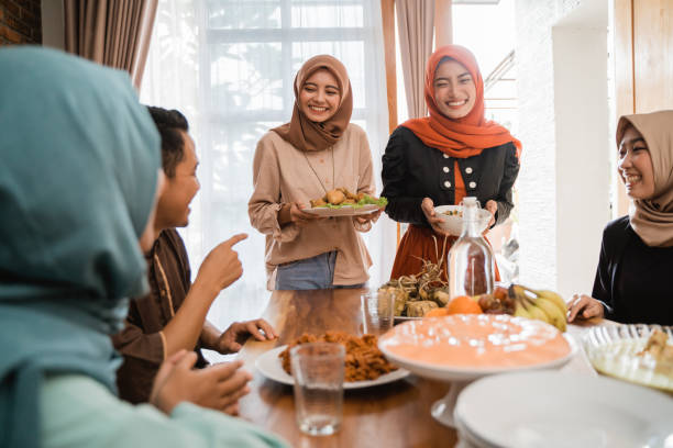 istock muslim people having some food together 1148175121