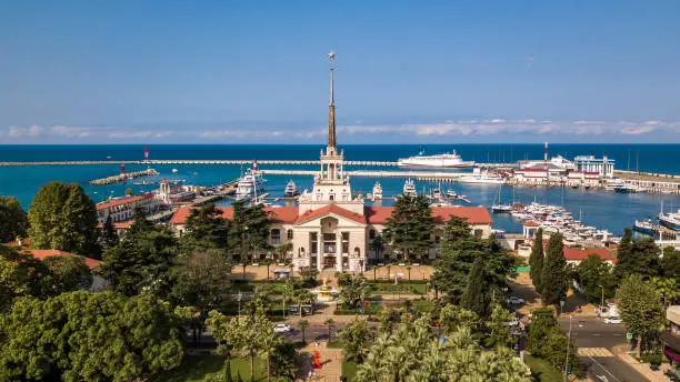 Aerial photography. Sea port with a bird's-eye view on a Sunny day. Yachts and boats are berthed. Promenade. Attraction of the city of Sochi. Ship Prince Vladimir in port.