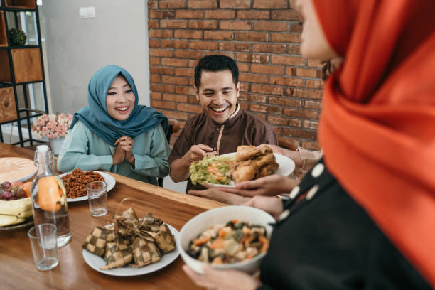 istock muslim people having some food together 1148178941